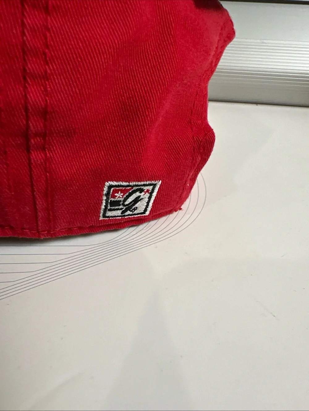 The Game Red Baseball Cap with White Embroidered Patch North Carolina State